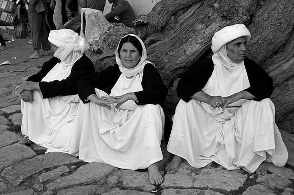 Three Yezidi Women in Outer Courtyard, Lalish (2012)
